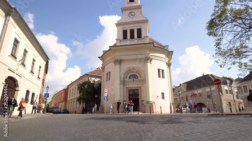 Tourists Walking Sqaure Becsi Kapu Lutheran Church Buda Castle Sunny Budapest Hungary Camera Approaching photo