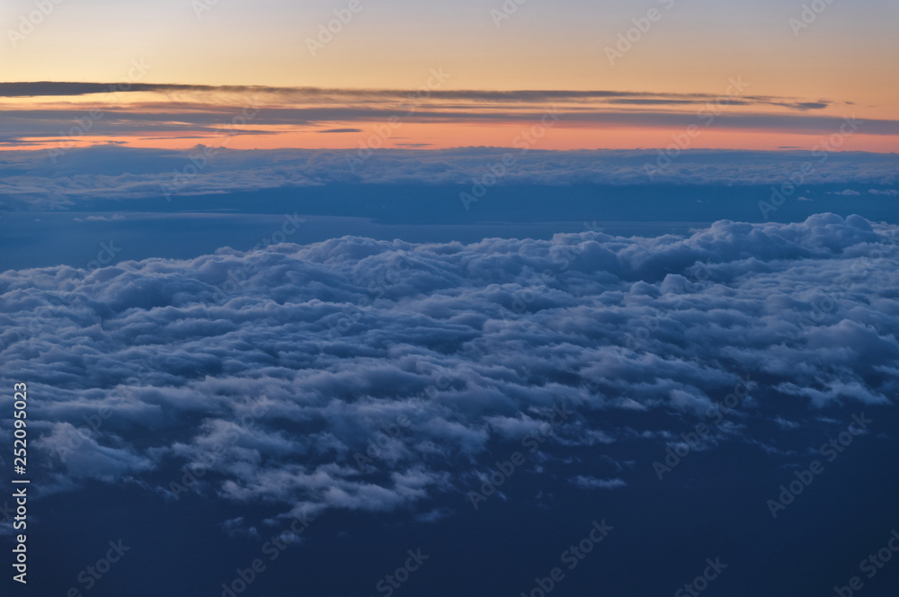 Beautiful Cloudscape Scene at Sunset from Airplane