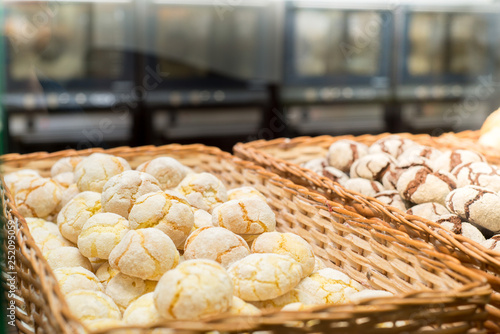 bakery products on display against the background of ovens in the bakery