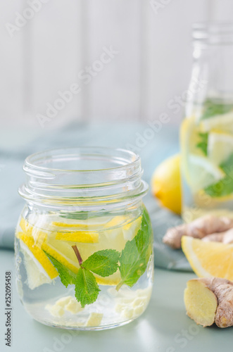 jar with healthy drink with mint, lemon, ginger