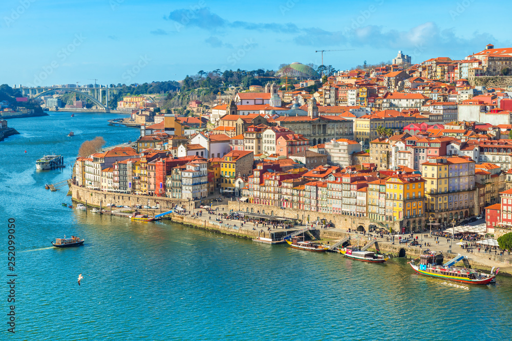 Cityscape of Porto (Oporto) old town, Portugal. Valley of the Douro River. Panorama of the famous Portuguese city. Popular tourist destination