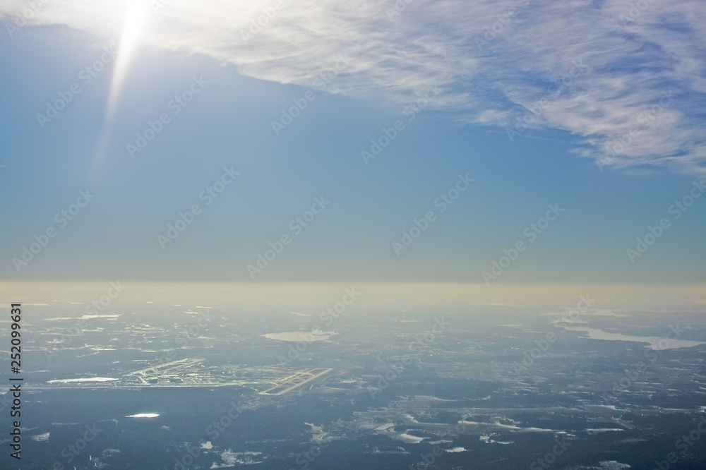 Aerial view over Arlanda airport in sunhaze Aerial view over Arlanda airport in sunhaze