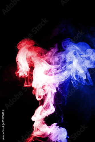 Column of vape clouds splash on black background. A lot of lines of smoke. Two colours fog is blue and purple. Stock isolated color smoke with spray boiling liquid. © Alexs