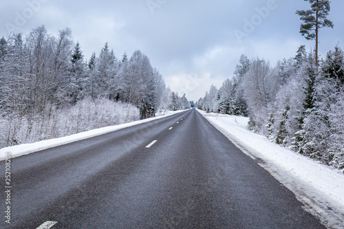 Snowy winter road in the south of Sweden