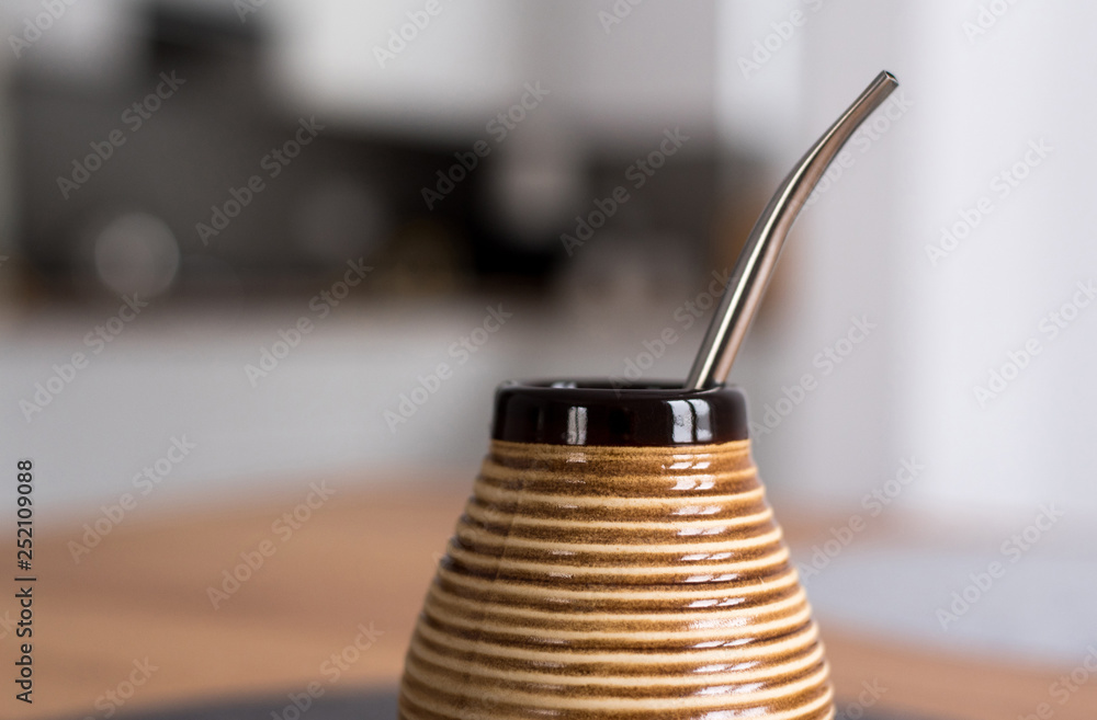 Traditional South American Yerba Mate tea in matero cup with bombilla ...