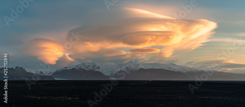 Lenticular clouds over icelandic mountains