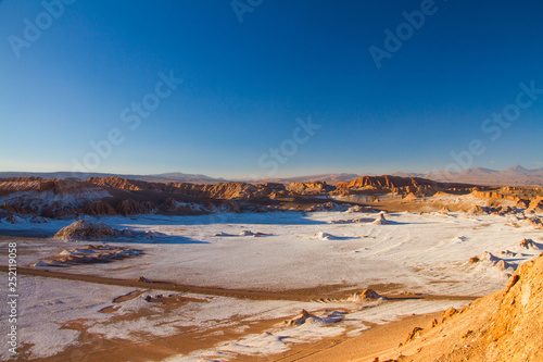 Wide panorama landscape of Moon Valley in Atacama desert, Andes mountain chain in the background, Chile, South America