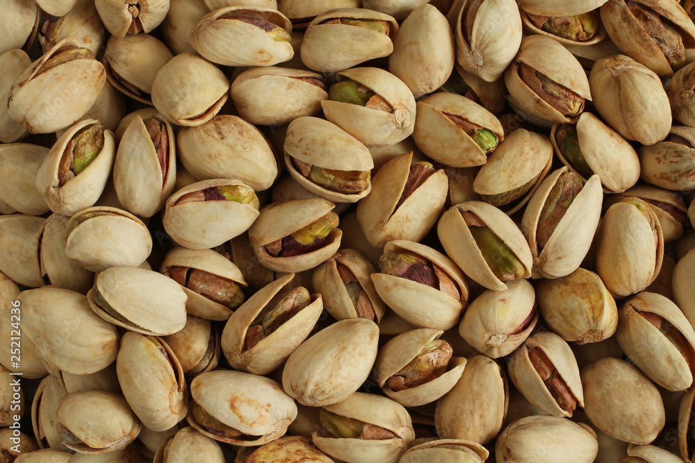 Salted pistachio nuts background Salted pistachio nuts background