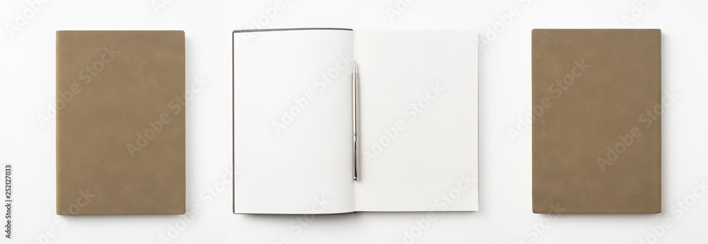 Fototapeta premium brown notebook and pen on white background
