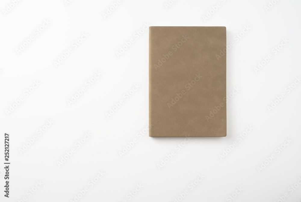 man hand hold brown notebook on white background man hand hold brown notebook on white background