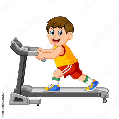 Young man in sportswear running on treadmill