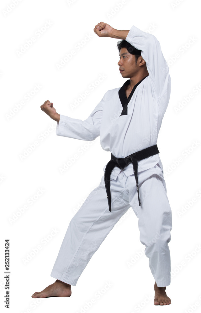 Master Black Belt TaeKwonDo handsome man instructor Teacher fighter show hit pose, studio lighting white background isolated. White formal fighting suit, motion blur hand foots on taekwondo post. Master Black Belt TaeKwonDo handsome man instructor Teacher fighter show hit pose, studio lighting white background isolated. White formal fighting suit, motion blur hand foots on taekwondo post.