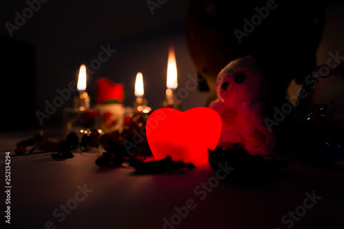 Beautiful candles and gifts burning on Valentine's Day