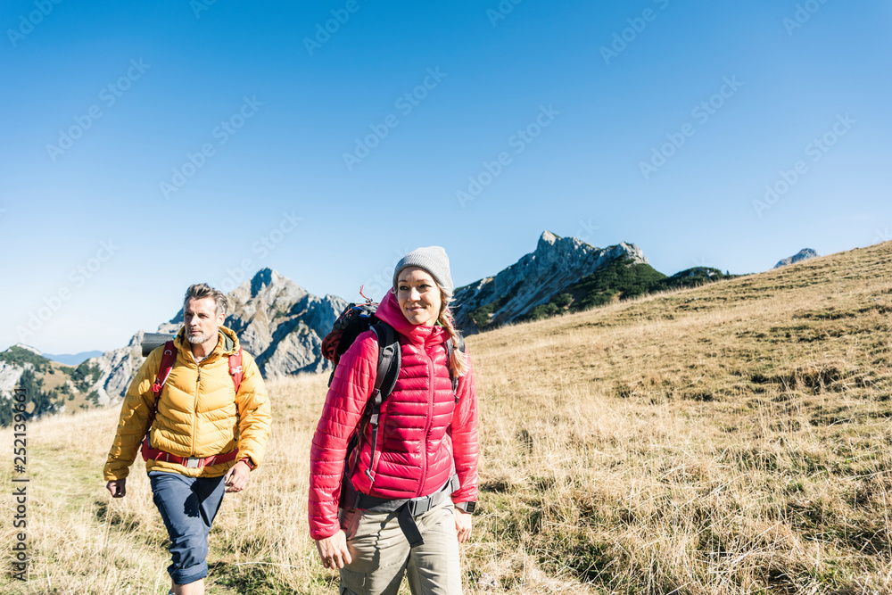 Austria, Tyrol, couple hiking in the mountains Austria, Tyrol, couple hiking in the mountains
