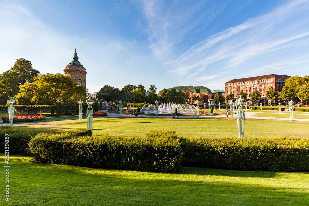 Germany, Mannheim, Friedrichsplatz with fountain and water tower in the background Germany, Mannheim, Friedrichsplatz with fountain and water tower in the background