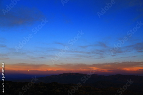 Full moon coming up over the San Pedro river valley in the Coronado National Forest.  © Thomas