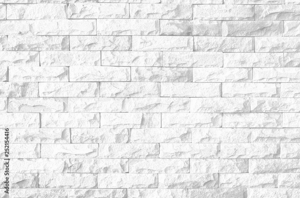 Fototapeta premium Abstract Black and White Structural Brick Wall. Panoramic Solid Surface. mosaic split slate stone tile