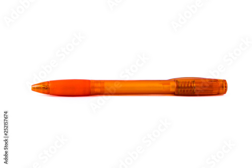 Orange plastic pen isolated on white background