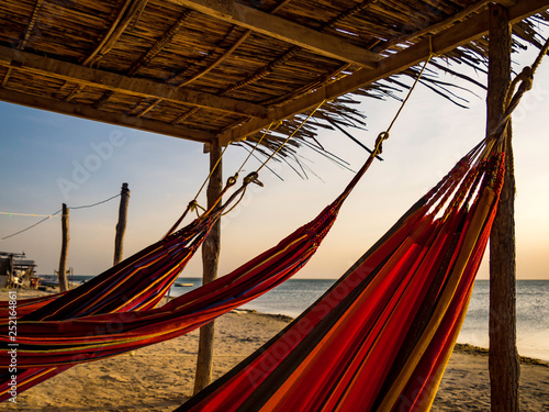 Obraz na płótnie Colorful hammocks in front of the beach in Cabo de la Vela, Colombia w salonie