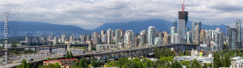 Downtown Vancouver  British Columbia  Canada - June 22  2018  Aerial Panoramic view of the modern city during a cloudy summer day.