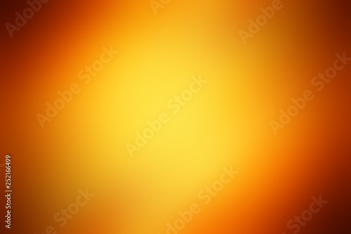 Orange gradient abstract background / abstract orange background. bokeh abstract light background. Summer background with a magnificent sun burst with lens flare. Hot with space for your message