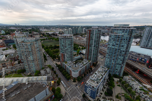 Downtown Vancouver  British Columbia  Canada - June 22  2018  Aerial view of the modern city during a cloudy sunset.