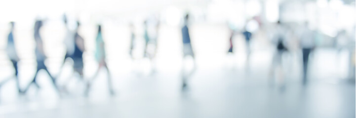 white blurred of people walking in city town. Defocused blur background.