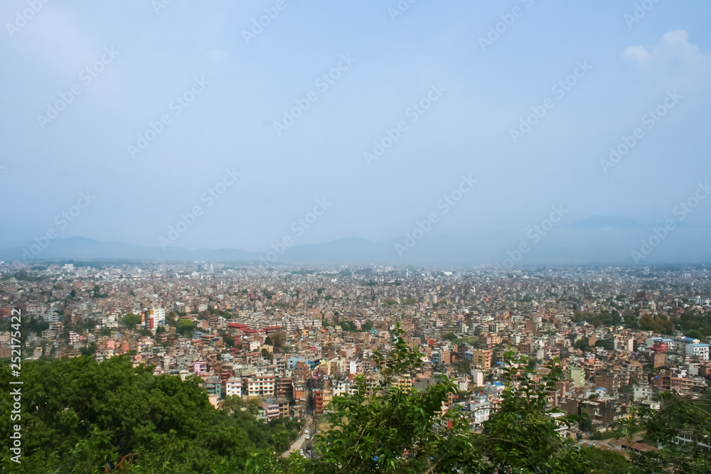 Panorama of the city among the mountains.