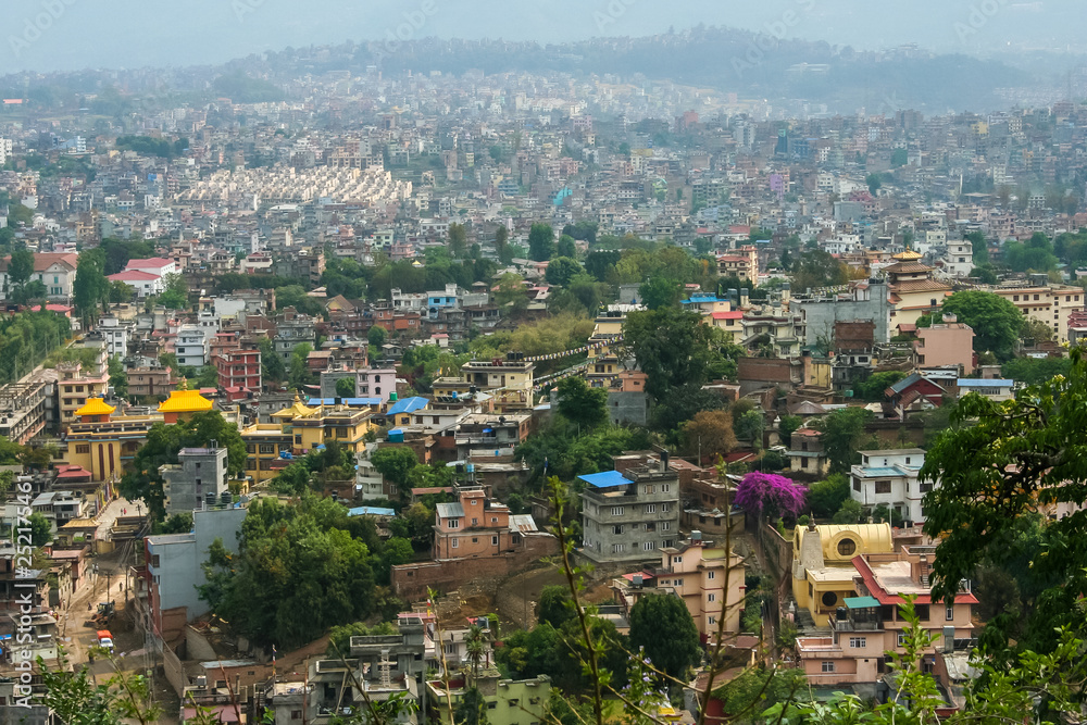 Fototapeta premium A large city with mountains.