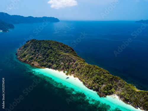 Aerial view of beautiful white sand beach and snorkel point at Cockburn island in Andaman sea near Ranong Thailand, Myanmar (Photo from Drone)