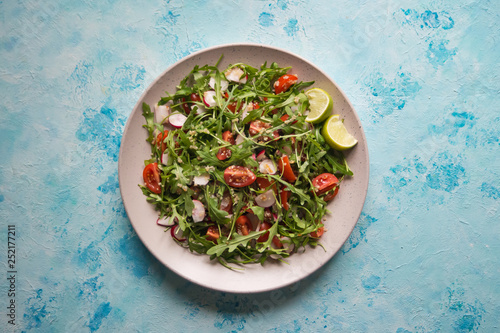 Fresh organic salad with arugula and quinoa. photo