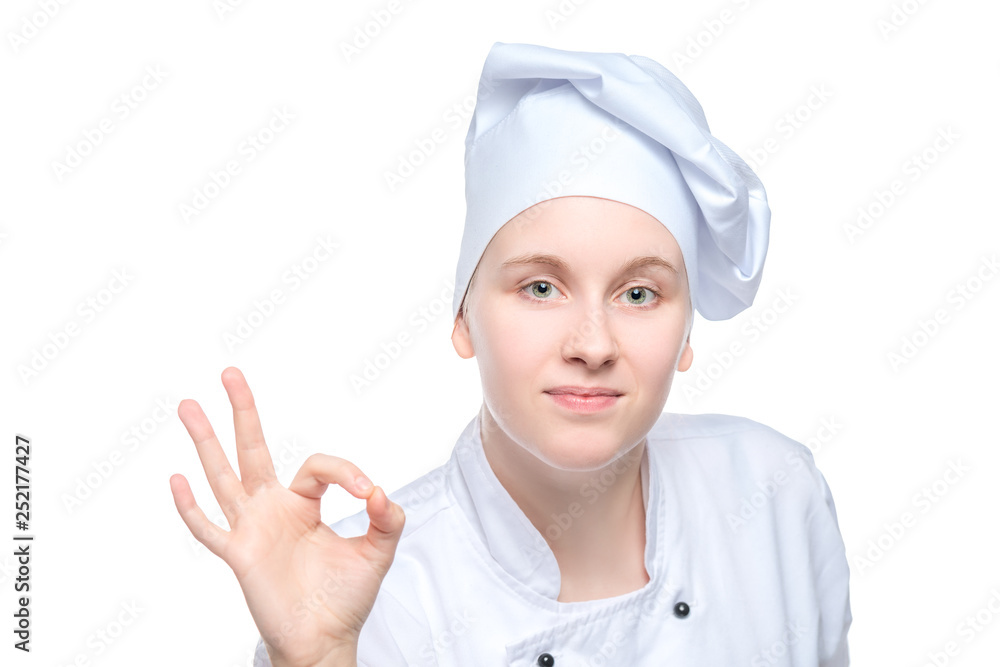 portrait of a young experienced chef with hand gesture on white background isolated portrait of a young experienced chef with hand gesture on white background isolated
