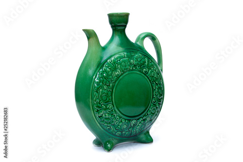 Green glazed water jug in three-quarter position photo