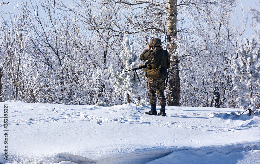 soldier in uniform in winter