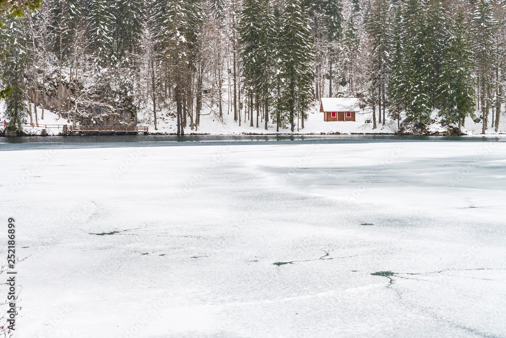 Snowfall on the Fusine lakes. Ghaccio and enchanting snow. Tarvisio, Friuli Snowfall on the Fusine lakes. Ghaccio and enchanting snow. Tarvisio, Friuli