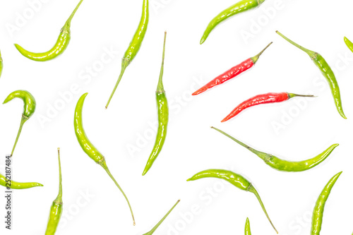 Top view fresh green and red chili pepper is a frame pattern isolated on white background.