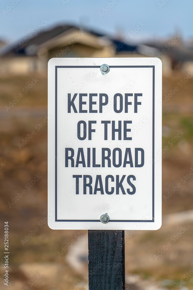 Keep Off Of The Railroad Tracks sign