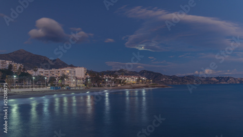 Nerja  Malaga  Andalusi  Spain - January 20  2019  Moon at the beginning of the night over the coastal town of Nerja  southern Spain