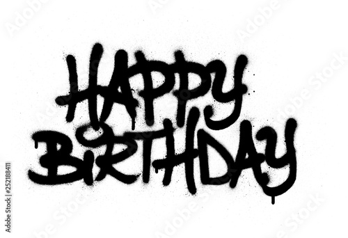 graffiti happy birthday sprayed in black over white