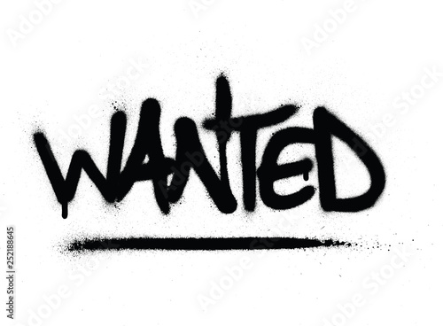 graffiti wanted word sprayed in black overwhite