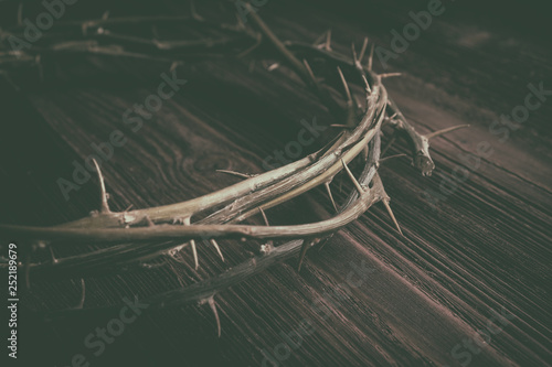 Jesus Christ Crown Thorns on Old Wood Table Background