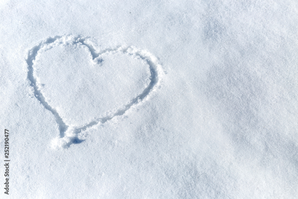 Heart painted on a snow