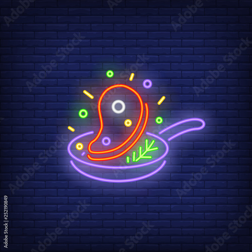 Frying beef steak on pan neon sign
