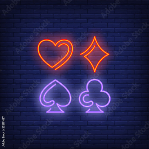 Playing card suit symbols neon sign
