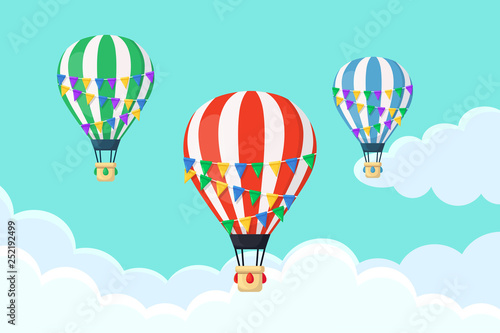 Hot air balloon in the sky with clouds. Flat cartoon design. Vector illustration
