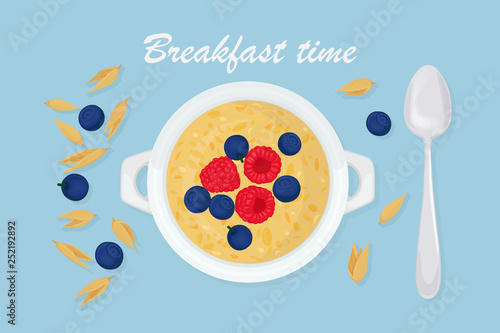 Porridge oats in bowl with spoon, berries, raspberry, nuts and cereals isolated on background. Healthy breakfast