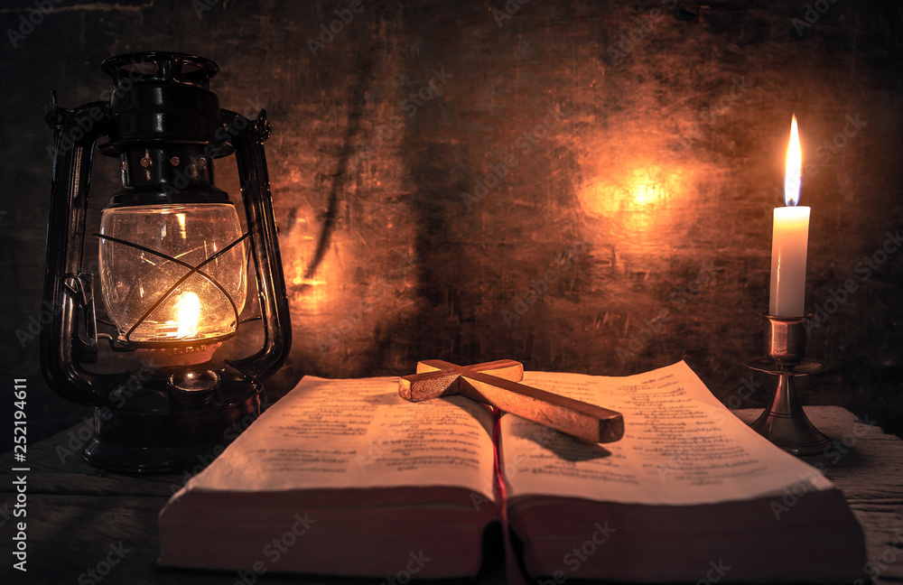 wooden cross on with light of oil and candle worship room. christian concept. Stock Photo | Adobe Stock