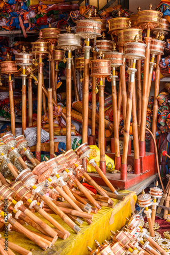 Mani wheels (hand prayer wheels) in Jokhang temple, Lhasa, Tibet, China. photo