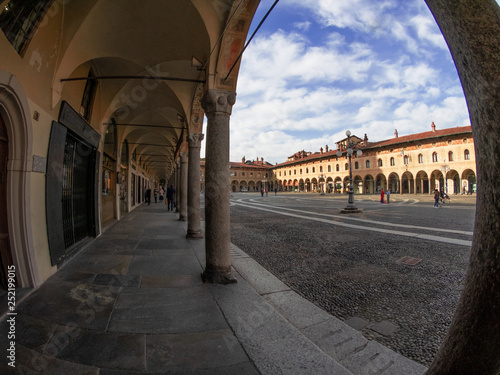 Vigevano - Italy, long arcade and historic buildings in Ducale square