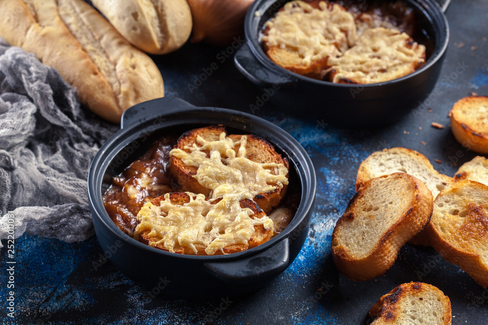 Delicious onion soup with croutons and cheese Delicious onion soup with croutons and cheese